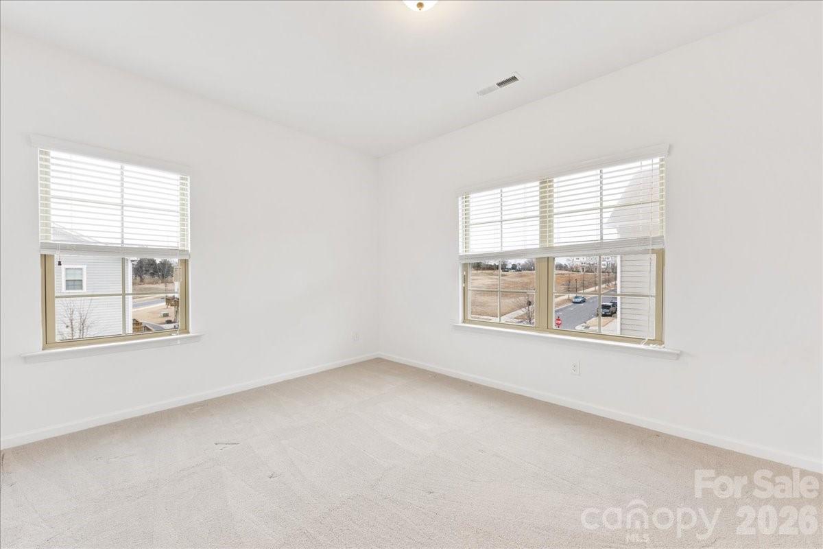 9205 Bluefield Street Charlotte, NC 28273 - Photo 33 of 48 an empty room with a window