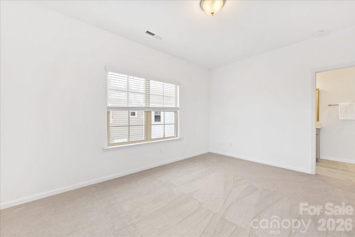 9205 Bluefield Street Charlotte, NC 28273 - Photo 34 of 48 an empty room with a window