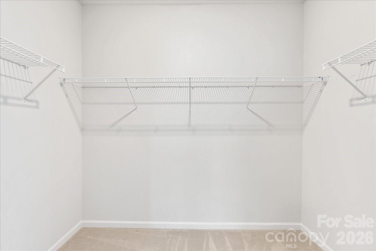 9205 Bluefield Street Charlotte, NC 28273 - Photo 38 of 48 a view of small space with racks on the wall