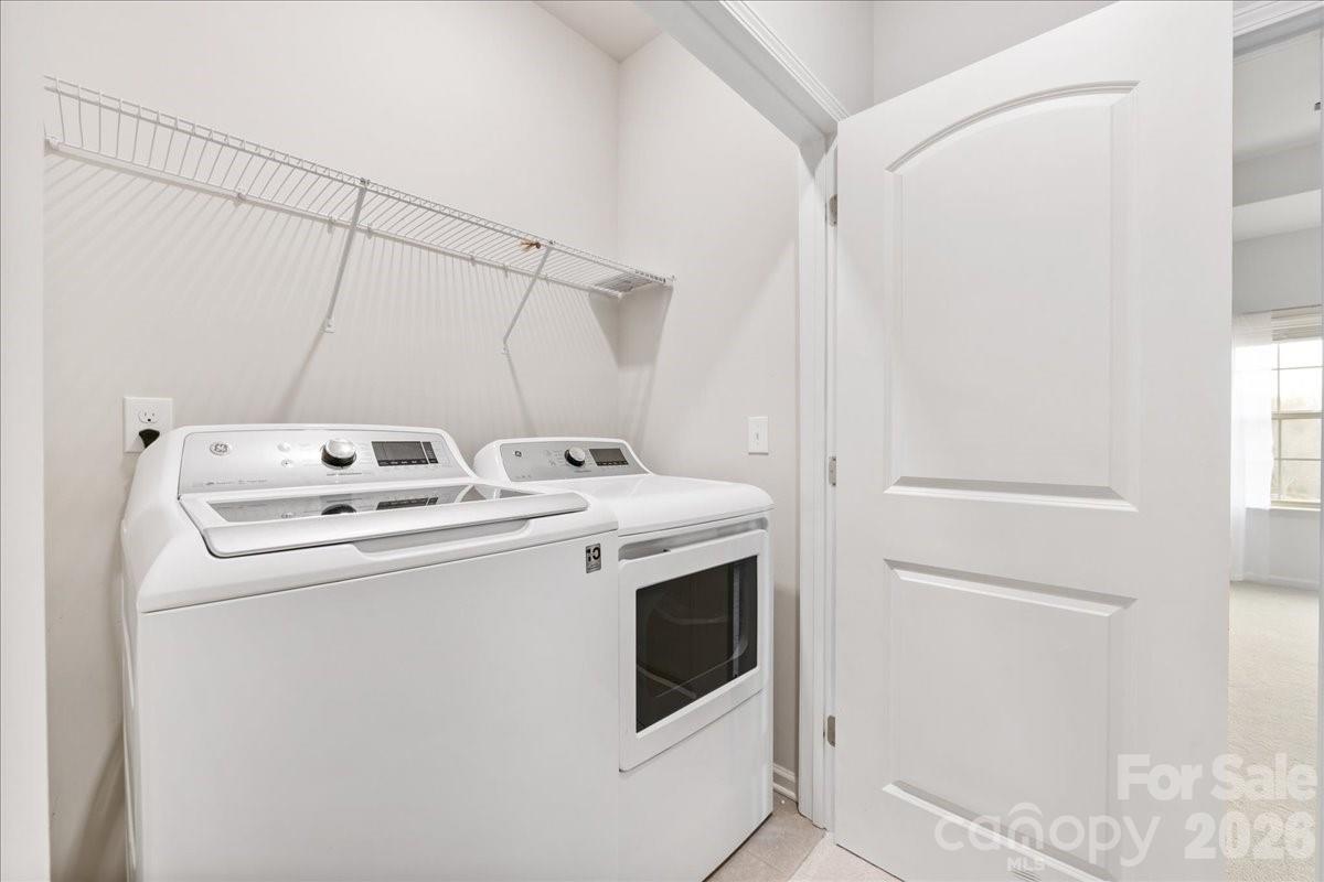 9205 Bluefield Street Charlotte, NC 28273 - Photo 39 of 48 a utility room with dryer and washer