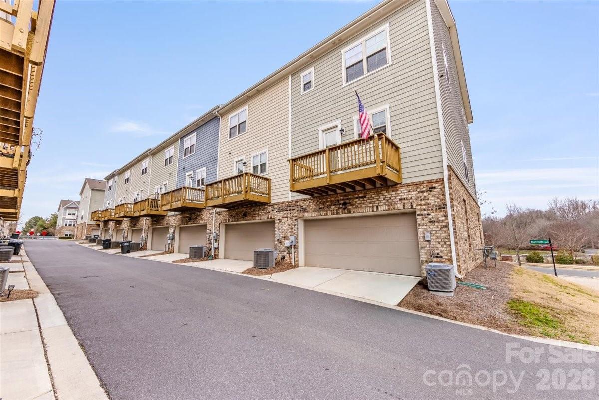 9205 Bluefield Street Charlotte, NC 28273 - Photo 40 of 48 a view of a building with street