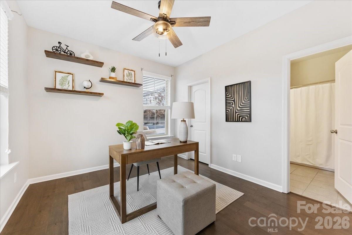 9205 Bluefield Street Charlotte, NC 28273 - Photo 5 of 48 a living room with furniture and a rug