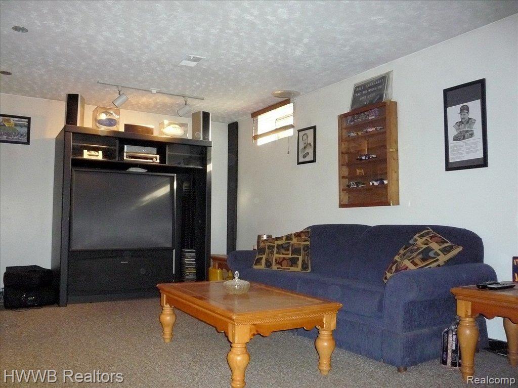 9945 Gibbs Road Clarkston, MI 48348 - Photo 15 of 20 Lower Level Family Room
