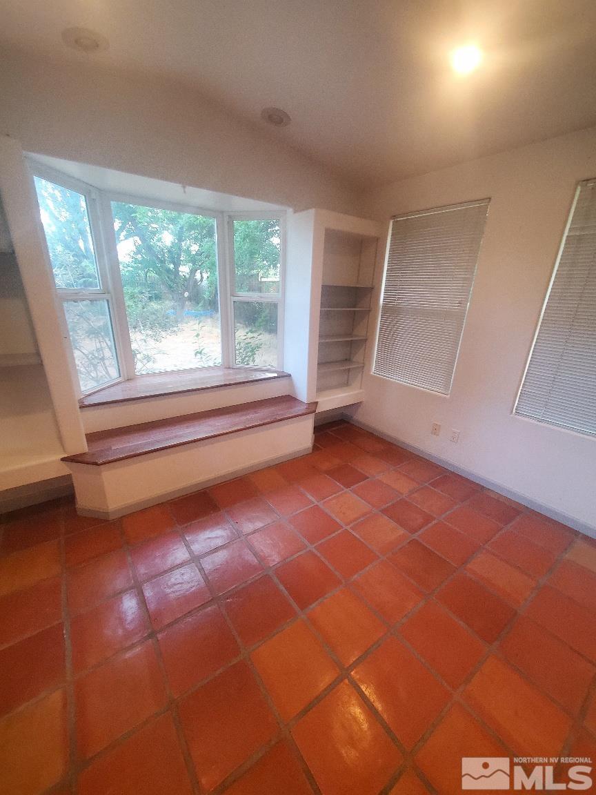 975 Bejay Place Reno, NV 89509 - Photo 12 of 33 a view of an empty room with a window