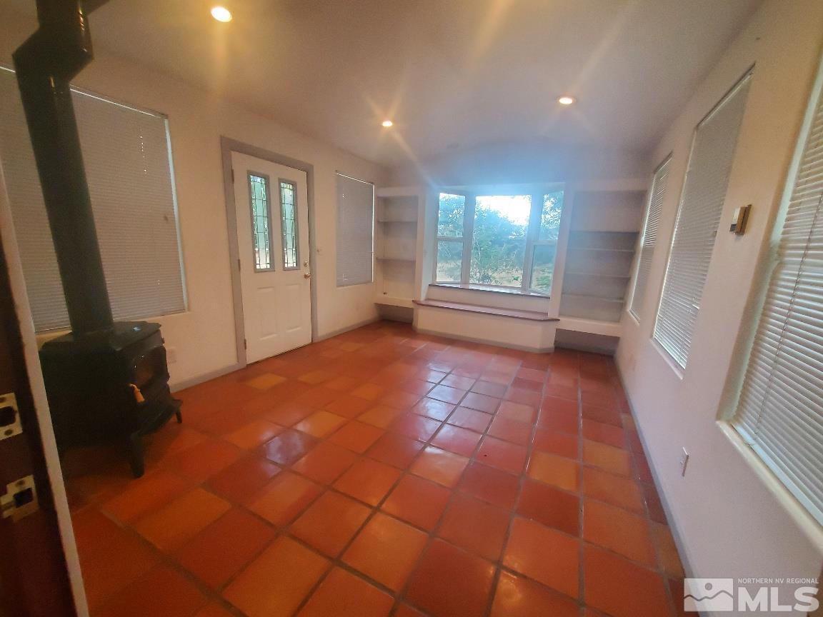 975 Bejay Place Reno, NV 89509 - Photo 15 of 33 a view of empty room with windows
