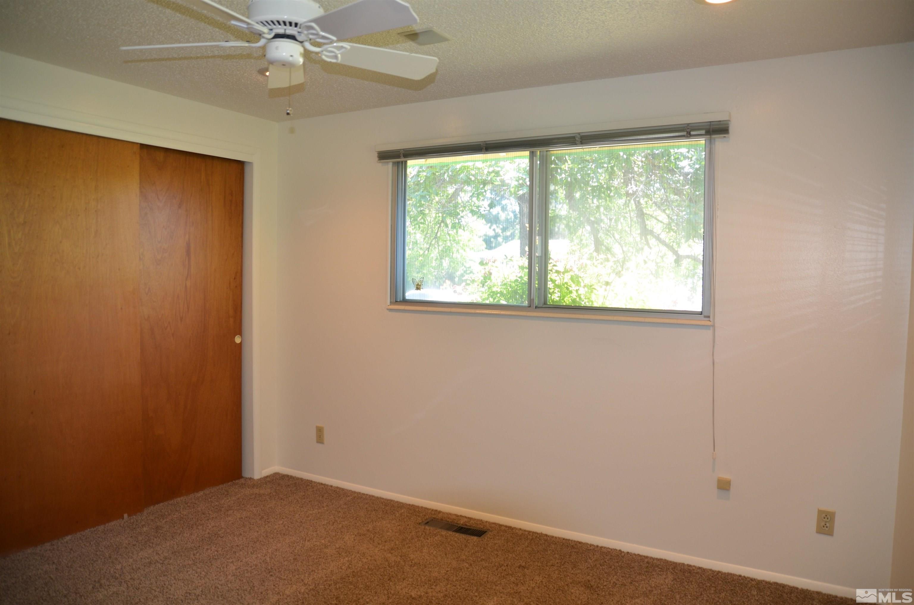 975 Bejay Place Reno, NV 89509 - Photo 17 of 33 an empty room with a window
