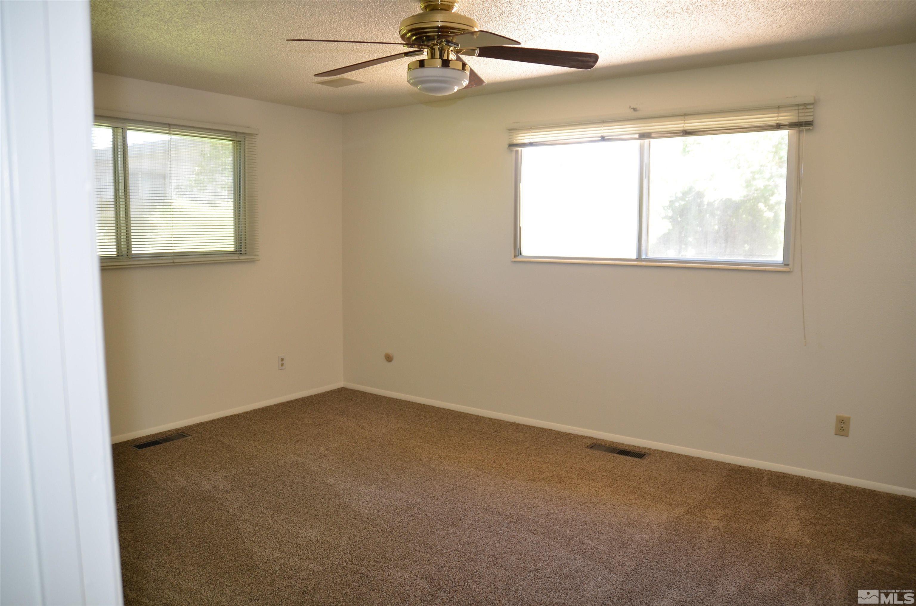 975 Bejay Place Reno, NV 89509 - Photo 19 of 33 an empty room with a window