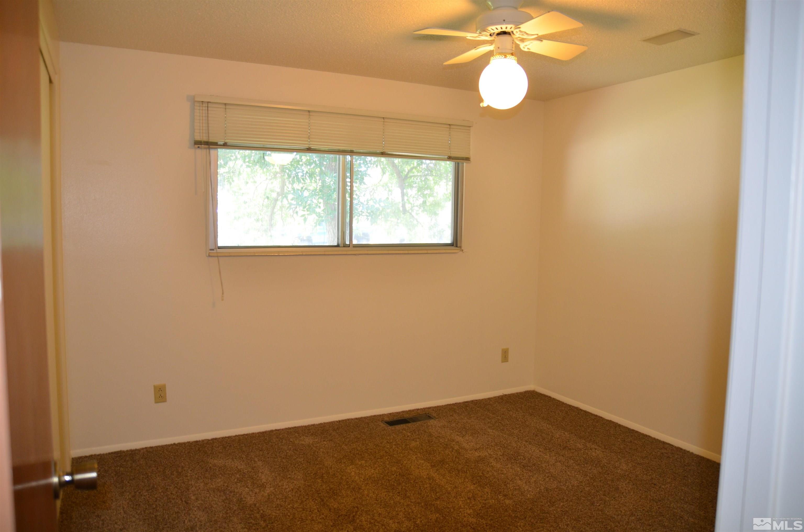 975 Bejay Place Reno, NV 89509 - Photo 20 of 33 an empty room with windows