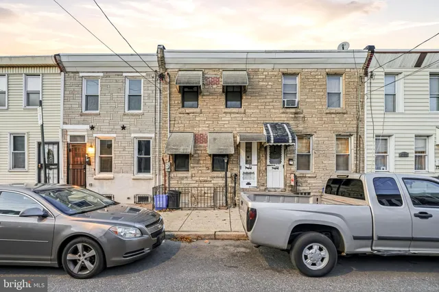 a car parked in front of a building