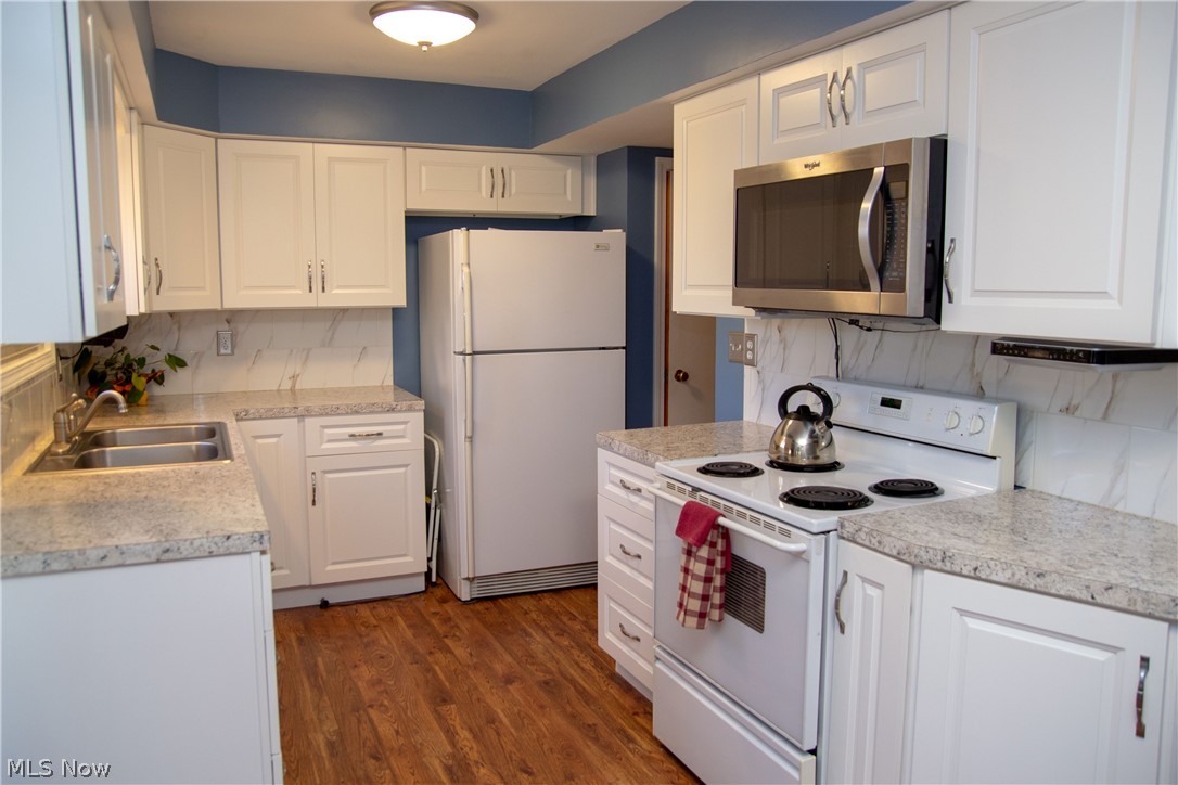 926 Ridge Road Northwest Canton, OH 44703 - Photo 9 of 35 The New Kitchen will make preparing your favorite dishes a breeze. (The door to the right of the refrigerator is a closet "pantry")