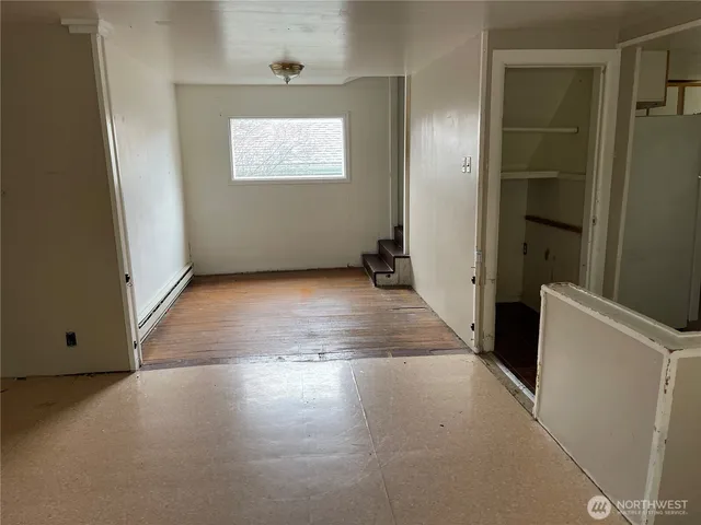 an empty room with windows