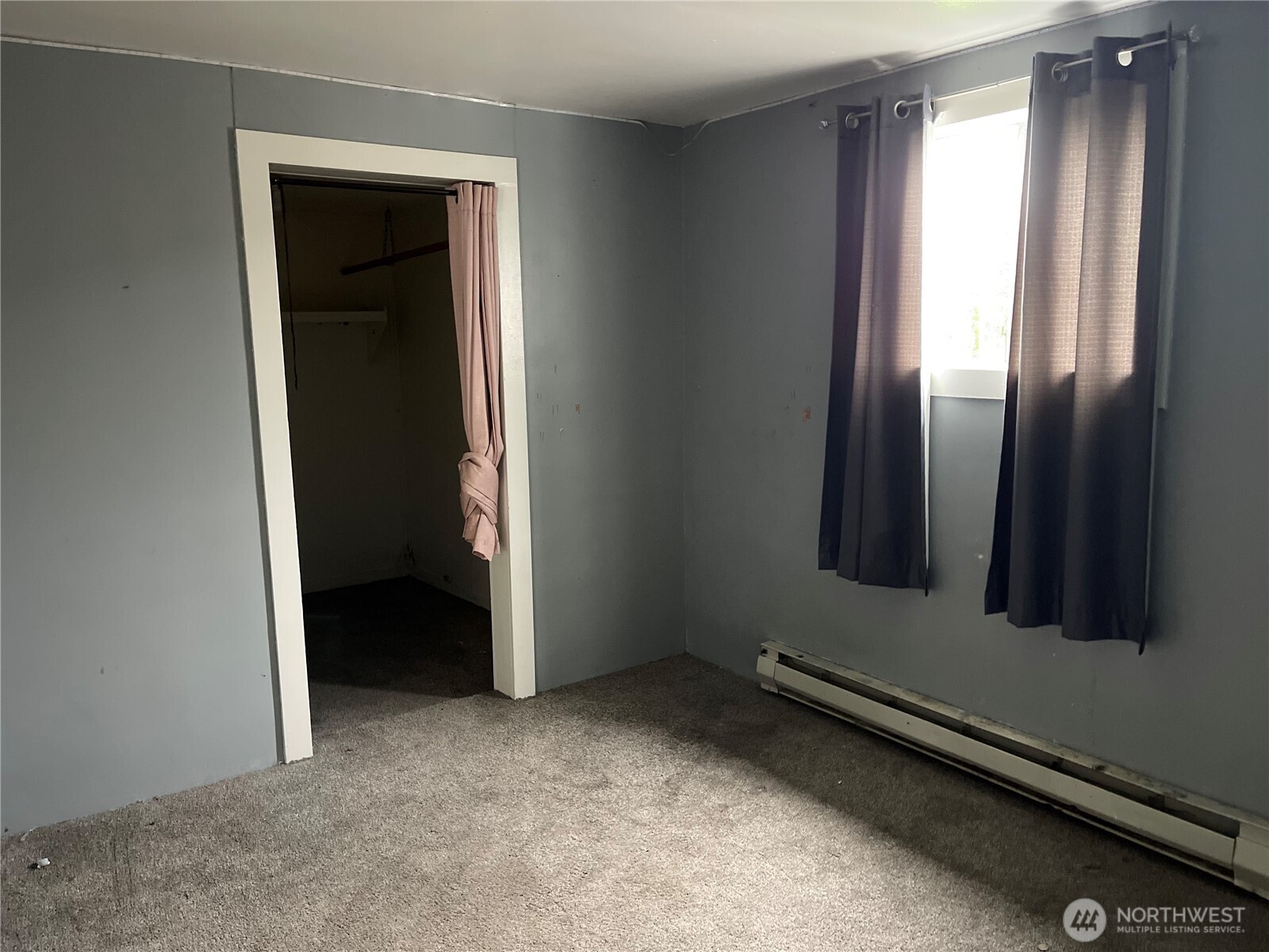 606 West Schley Street Aberdeen, WA 98520 - Photo 15 of 19 a view of a room with wooden floor and a window