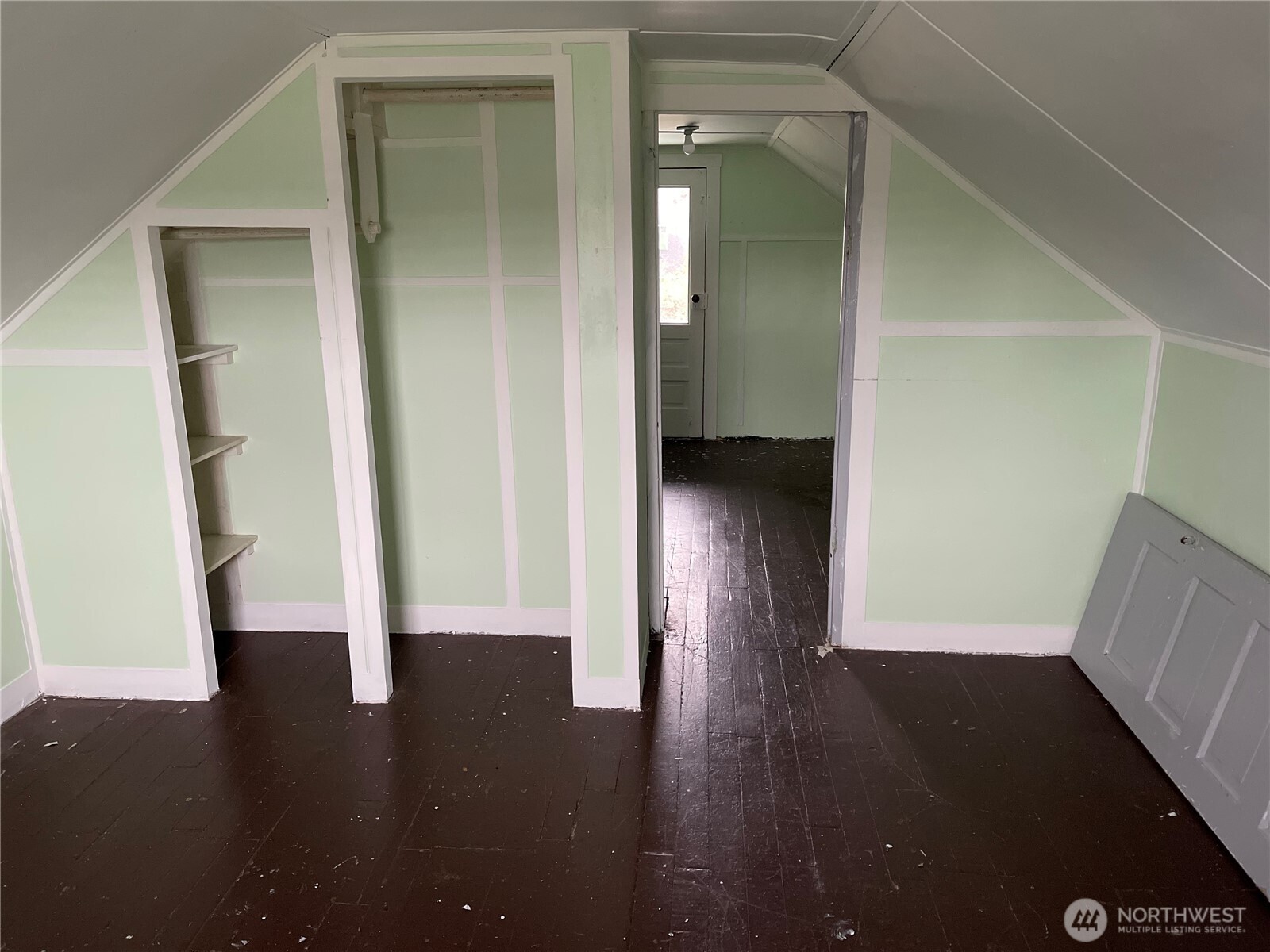 606 West Schley Street Aberdeen, WA 98520 - Photo 17 of 19 a view of a hallway with wooden floor