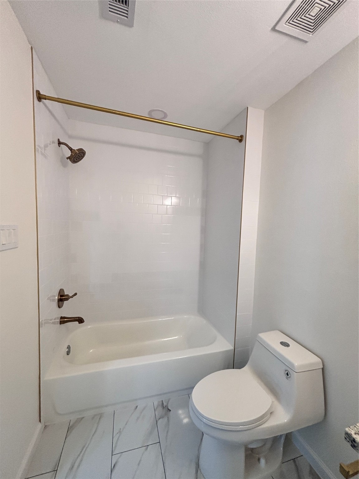 9913 Porto Rico Road, Unit B Houston, TX 77041 - Photo 15 of 26 a bathroom with a toilet and a bath tub