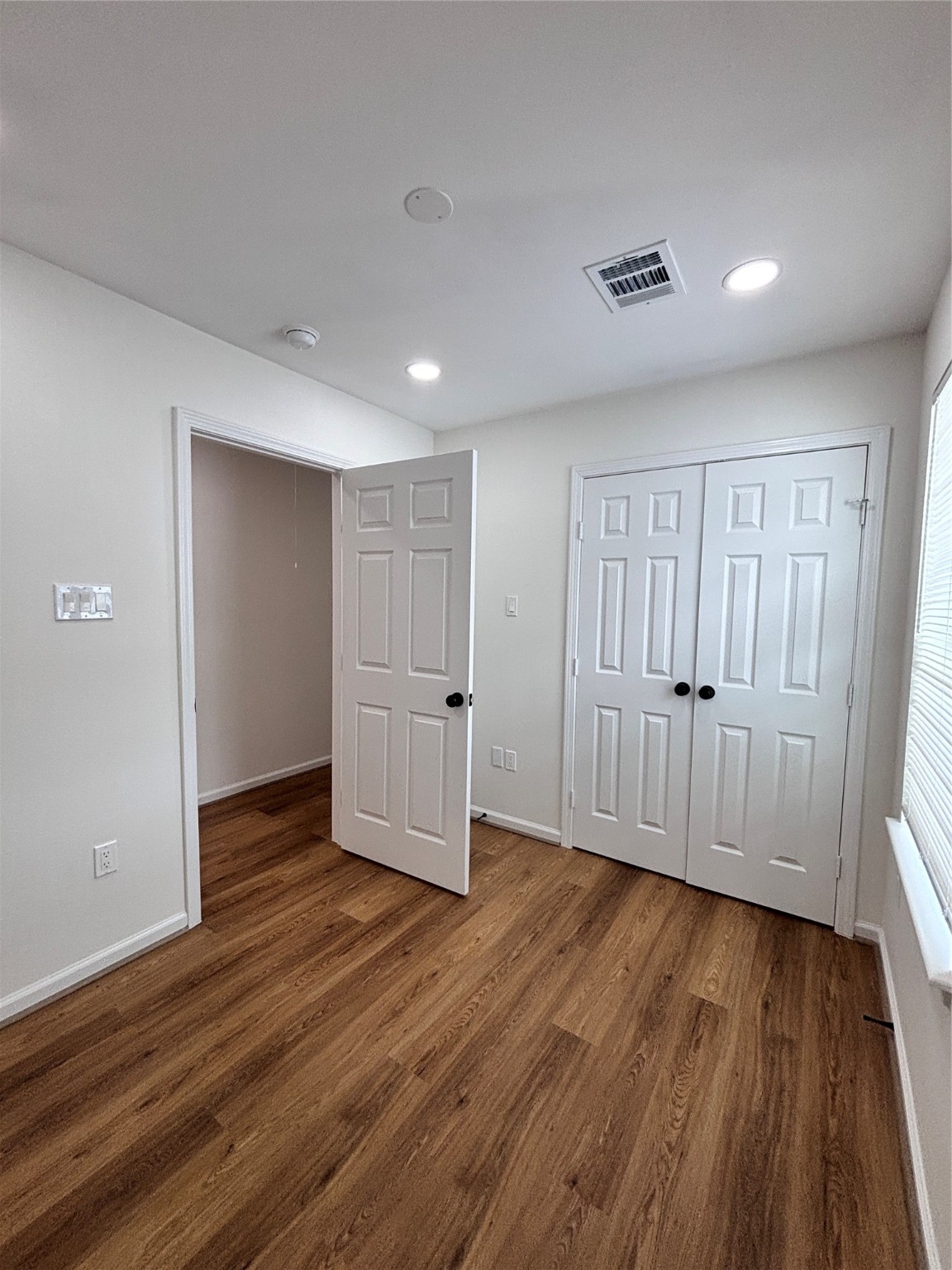 9913 Porto Rico Road, Unit B Houston, TX 77041 - Photo 19 of 26 a view of wooden floor in an empty room