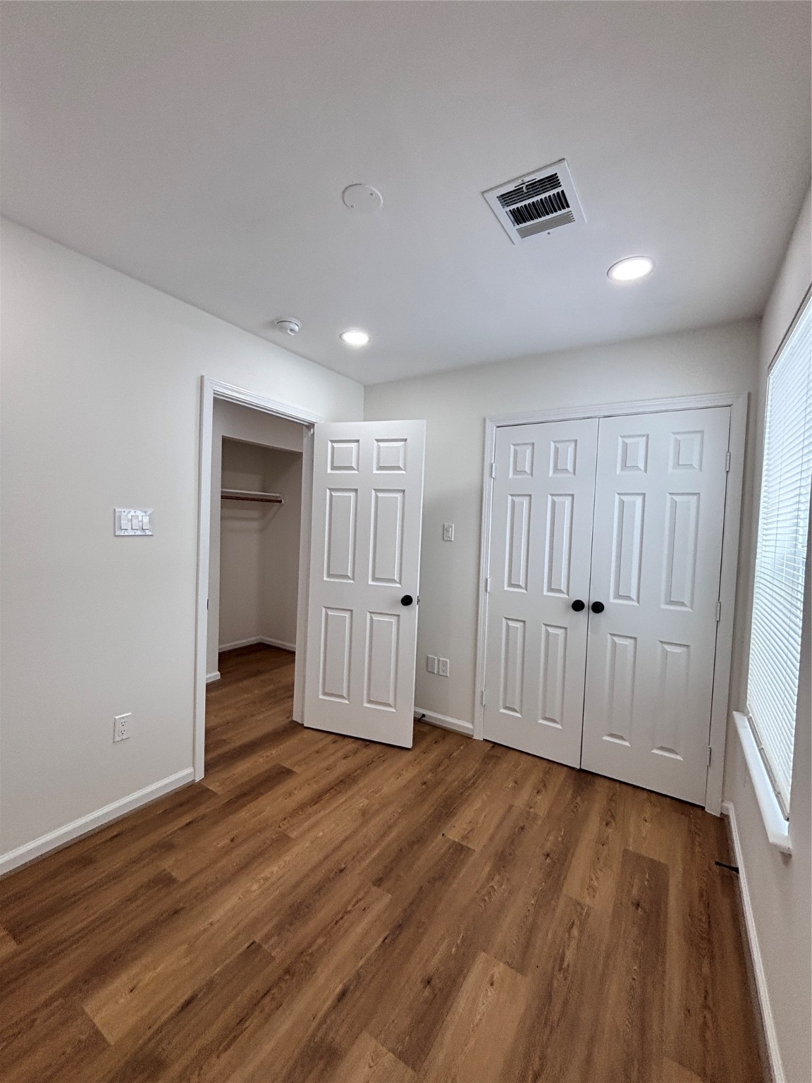 9913 Porto Rico Road, Unit B Houston, TX 77041 - Photo 20 of 26 a view of empty room with wooden floor