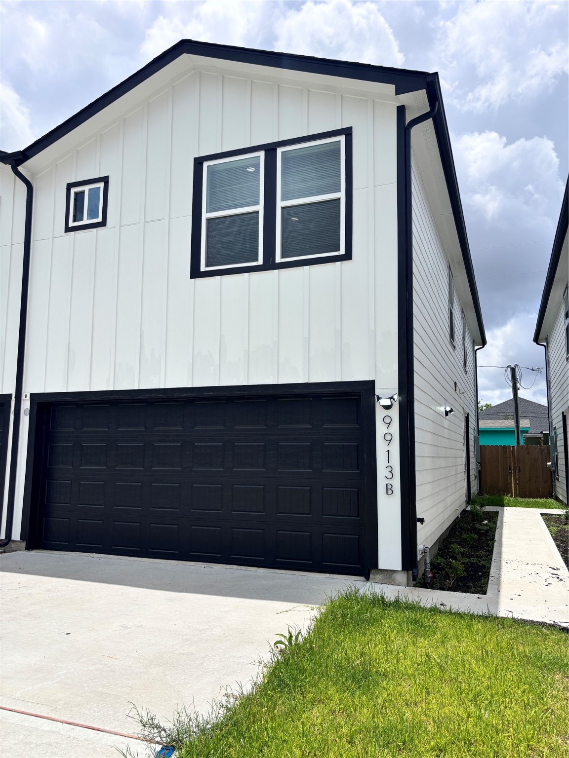 9913 Porto Rico Road, Unit B Houston, TX 77041 - Photo 2 of 26 a black car parked in front of a house