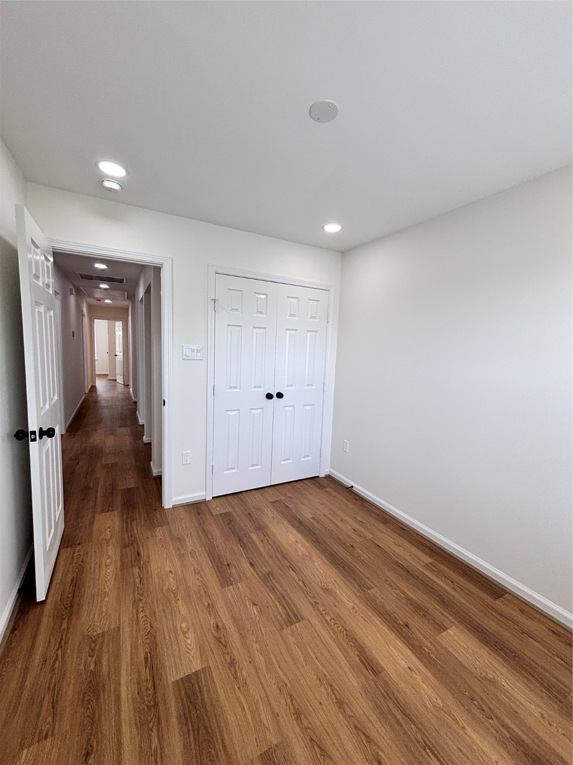 9913 Porto Rico Road, Unit B Houston, TX 77041 - Photo 24 of 26 a view of empty room with wooden floor