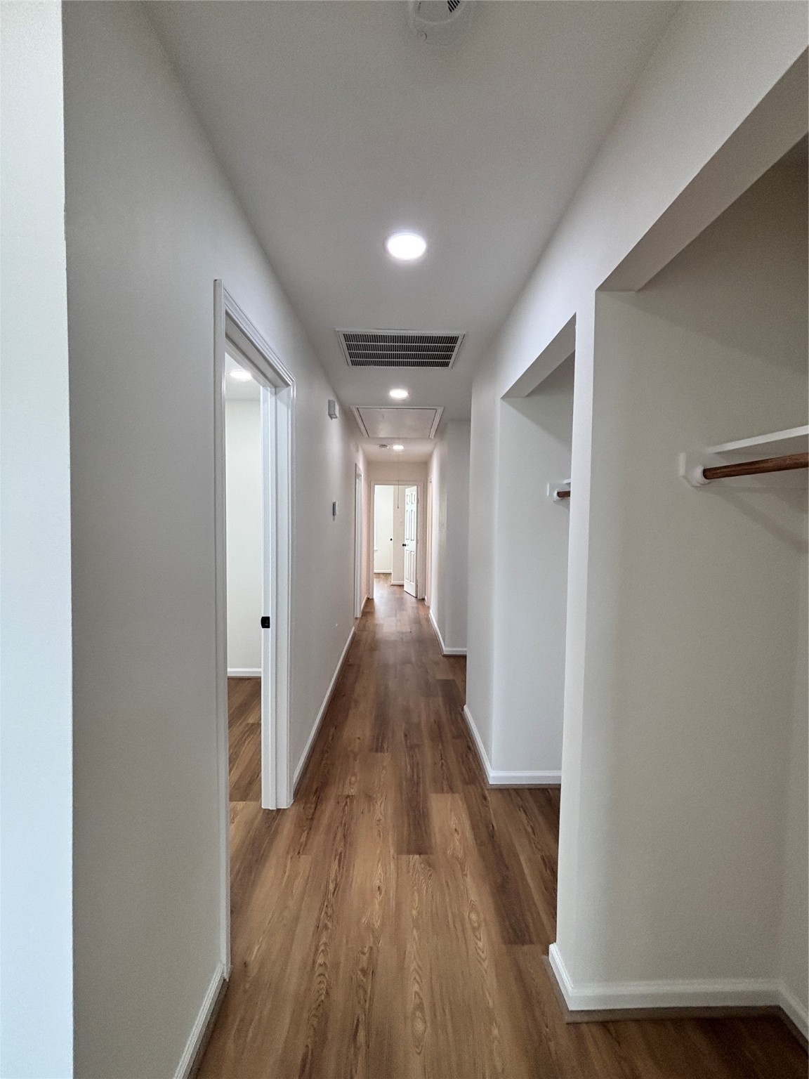 9913 Porto Rico Road, Unit B Houston, TX 77041 - Photo 25 of 26 a view of a hallway with wooden floor