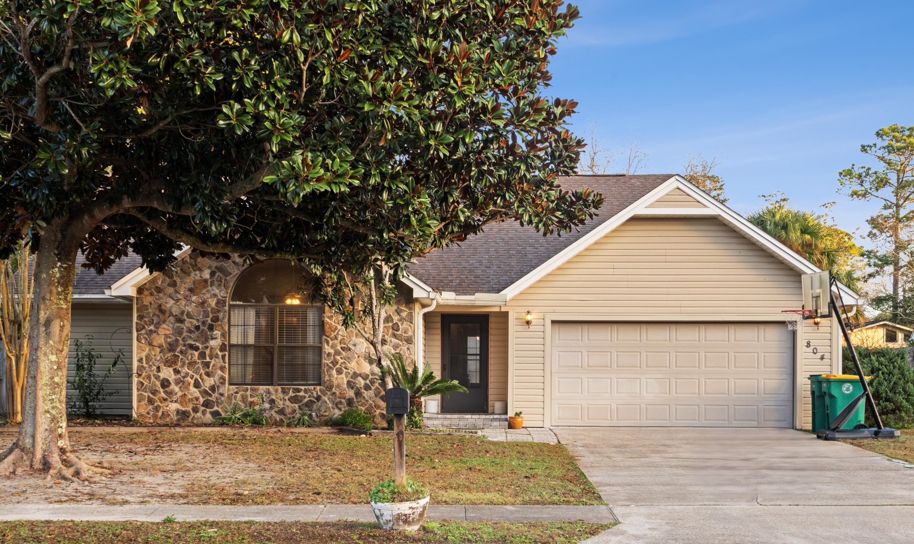 front view of house with a yard