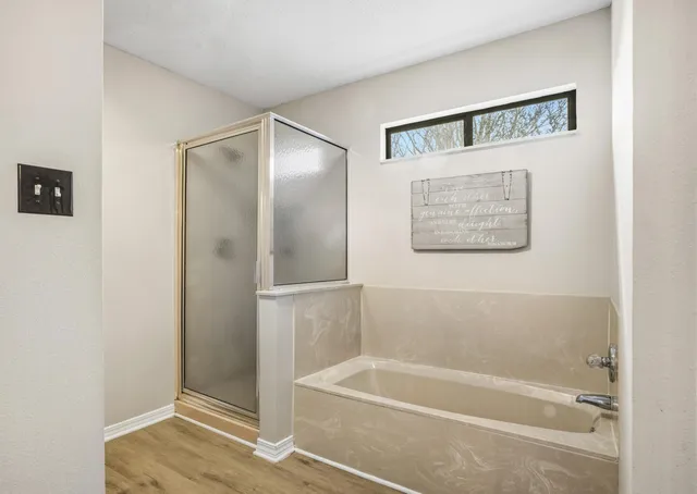 a bathroom with a bathtub