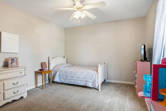 a view of a bathroom from a hallway