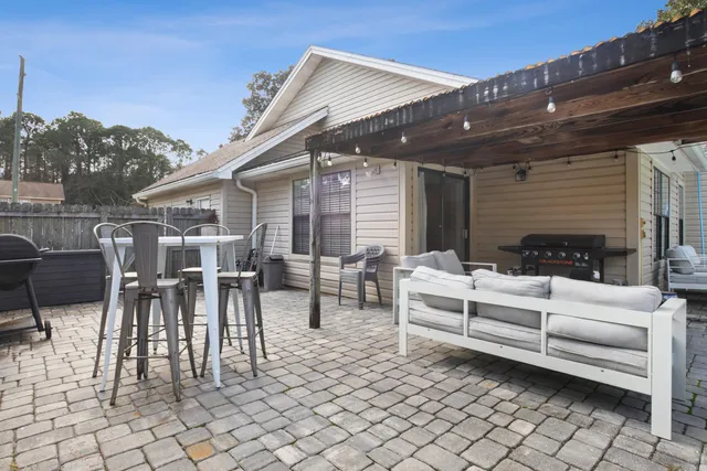 a view of a swimming pool with a patio