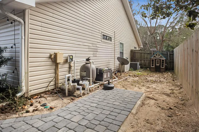 a view of a swimming pool with an outdoor space and seating area