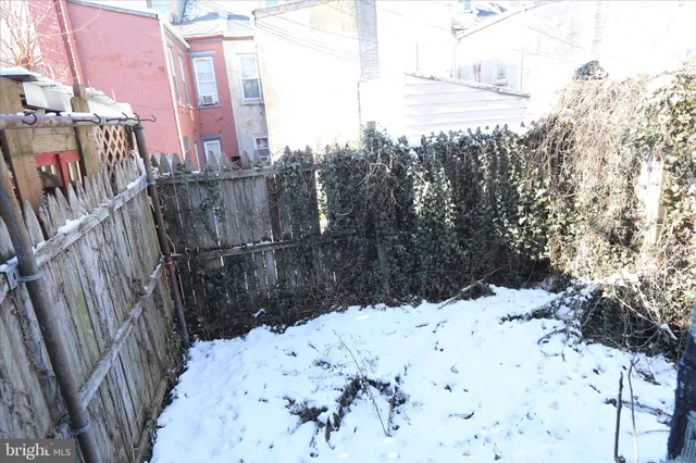 a view of snow on the road