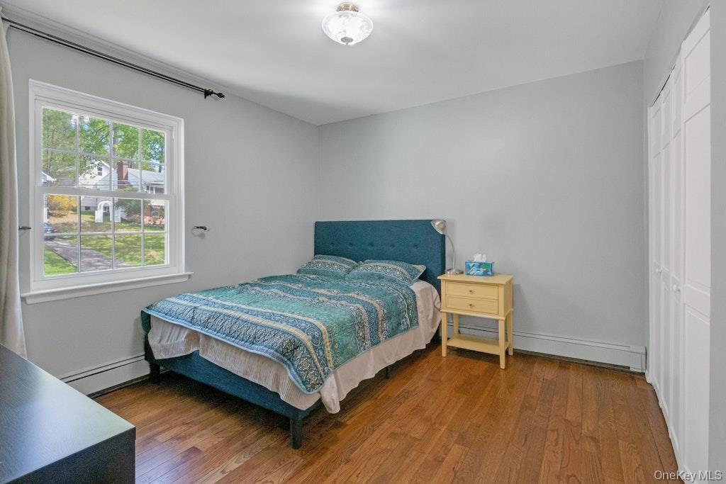 34 Jackson Road Briarcliff Manor, NY 10510 - Photo 20 of 29 a bedroom with a bed and a window