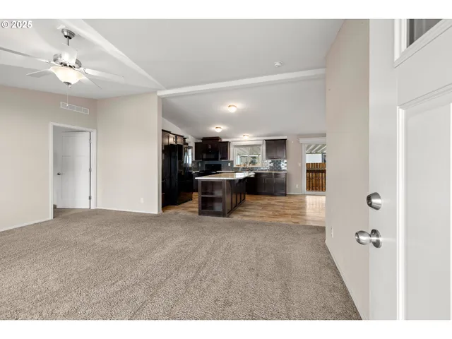 a view of kitchen and kitchen with furniture