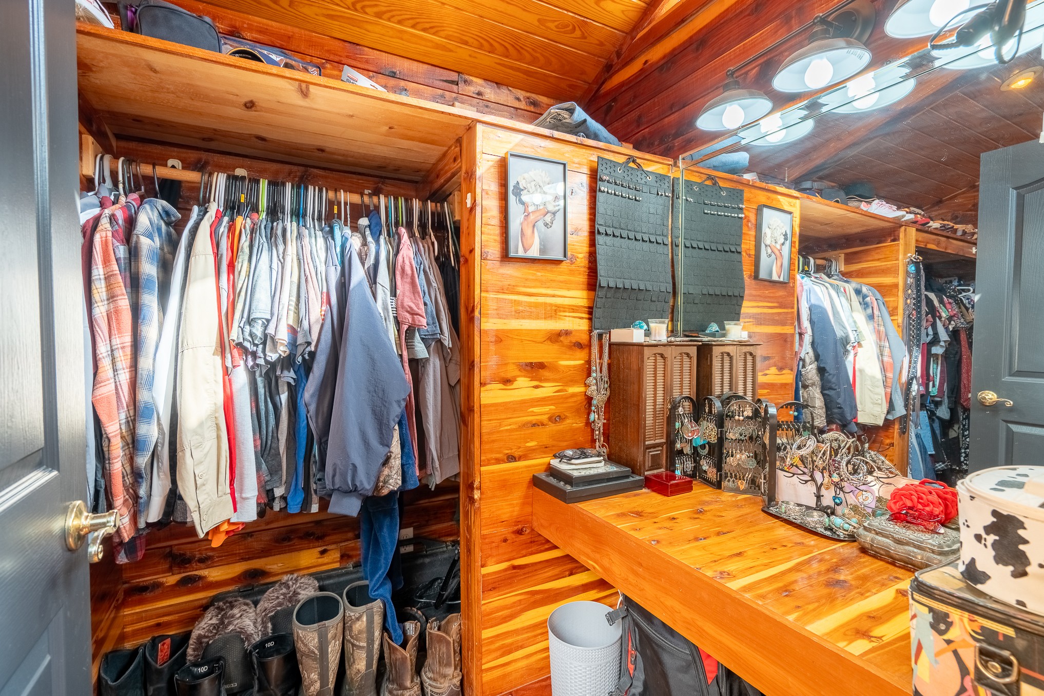 999 Rainbow Lake Road Waynesboro, TN 38485 - Photo 16 of 44 a view of walk in closet with clothes and shoes
