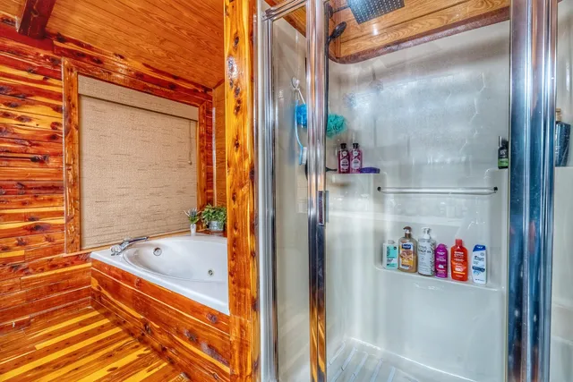 a bath tub sitting next to a bathroom
