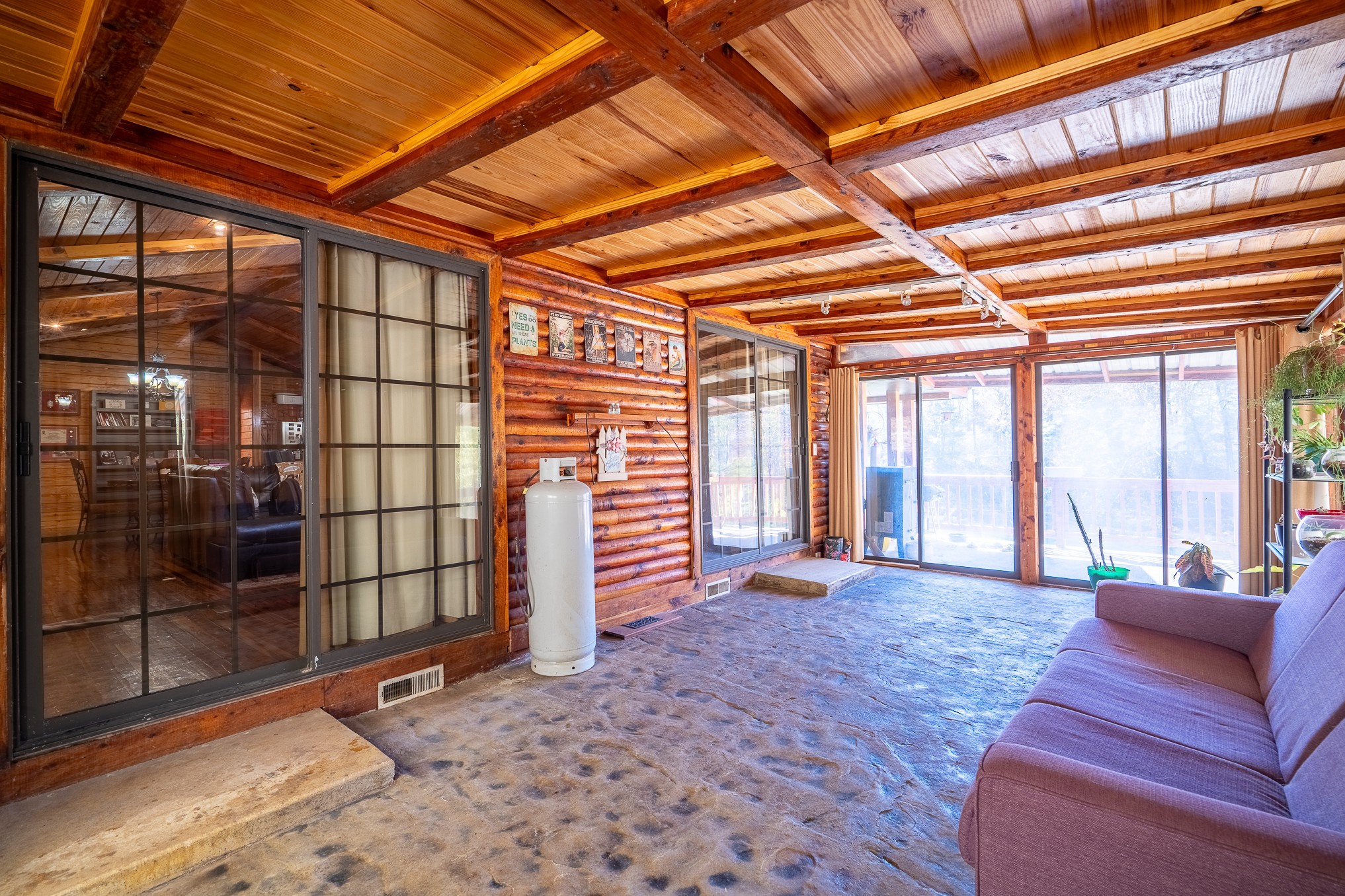 999 Rainbow Lake Road Waynesboro, TN 38485 - Photo 30 of 44 a view of a hall with wooden floor and iron stairs