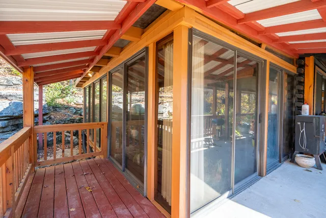 a front view of a house with a porch