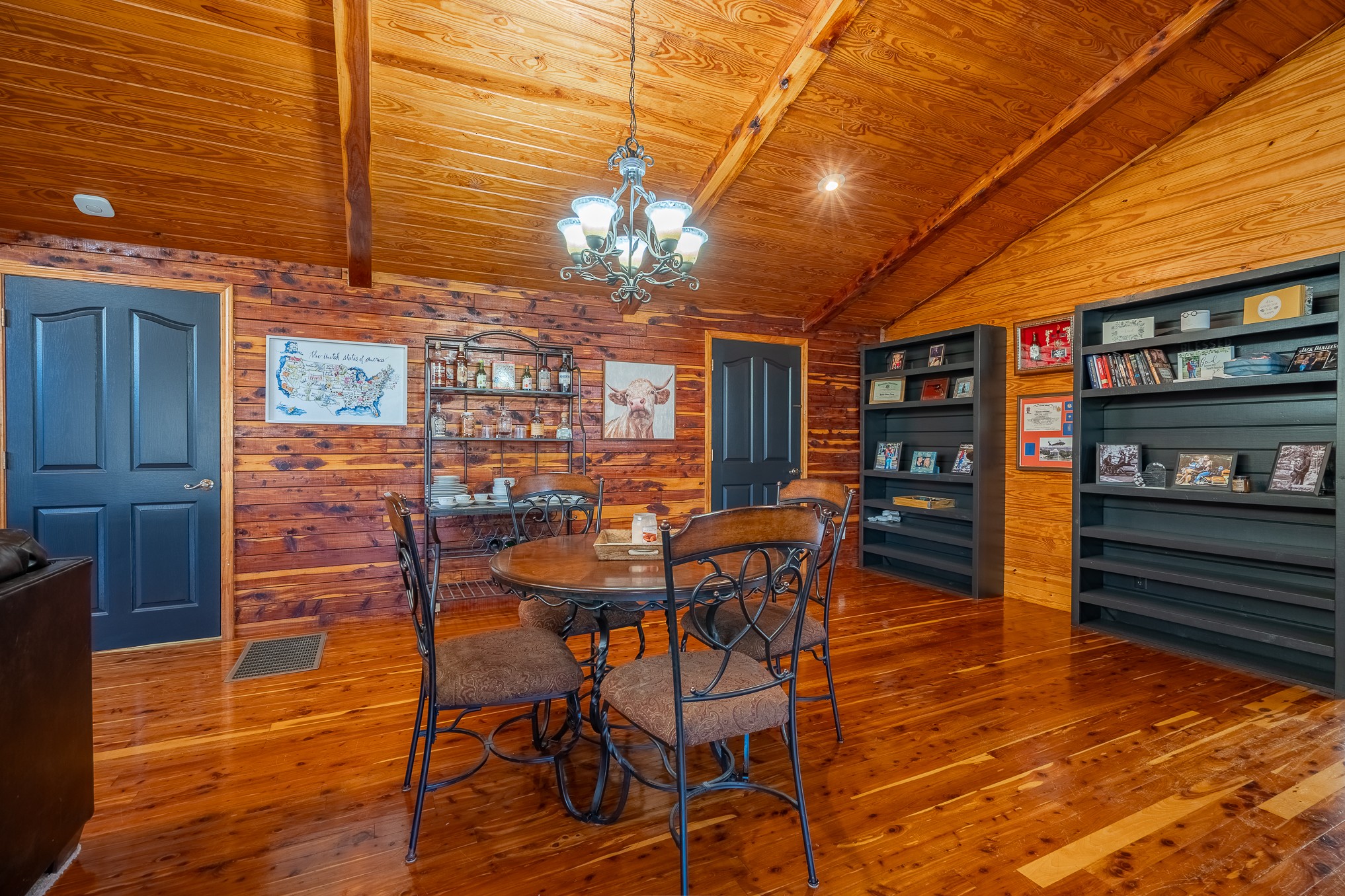 999 Rainbow Lake Road Waynesboro, TN 38485 - Photo 9 of 44 a view of a dining room with furniture and chandelier