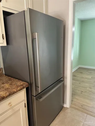 a view of hallway with washer and dryer