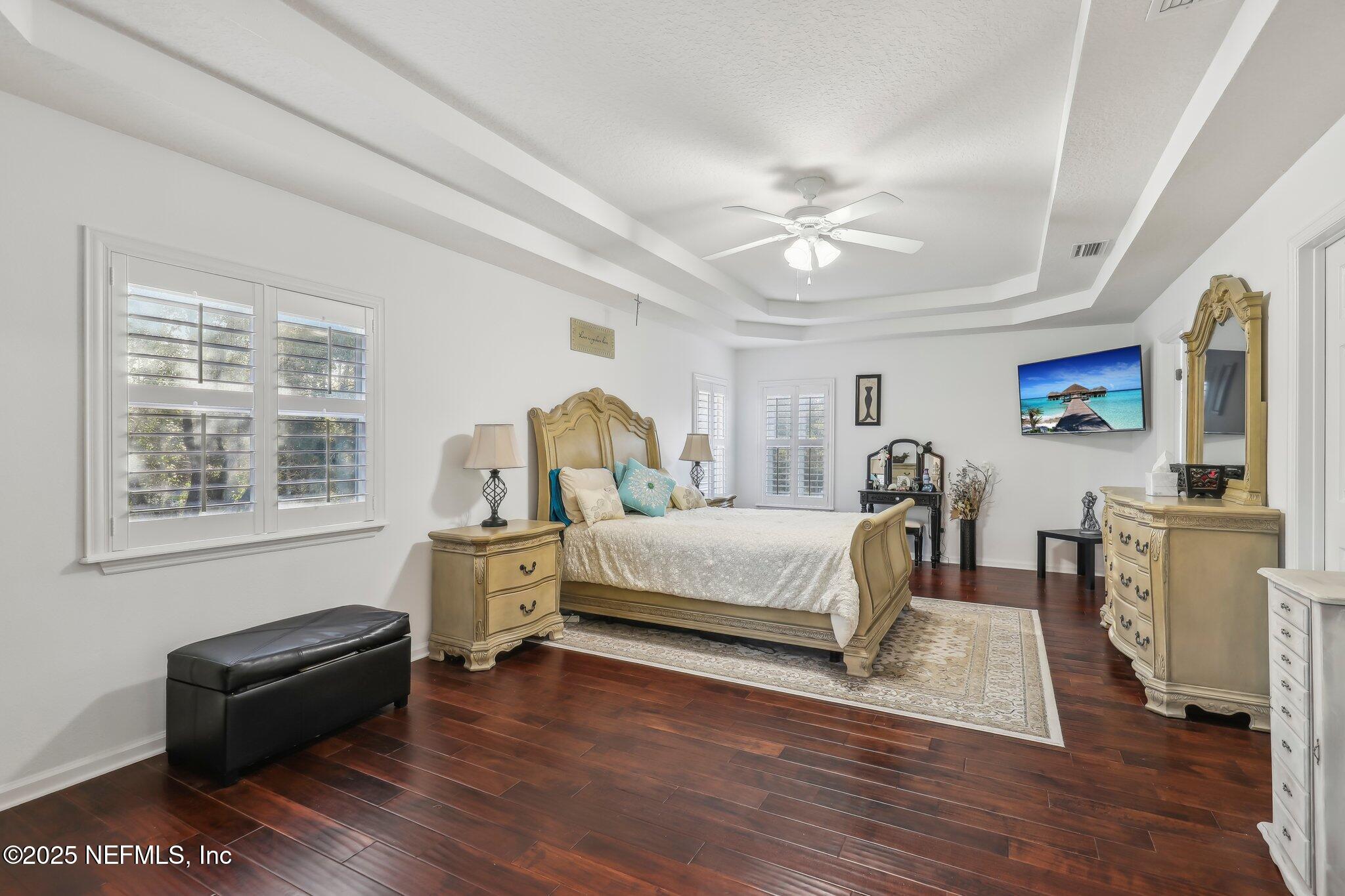 216 Brantley Harbor Drive St. Augustine, FL 32086 - Photo 21 of 33 a bedroom with furniture and a window