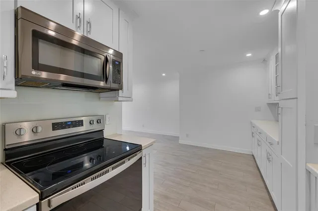 a view of a balcony with floor to ceiling window