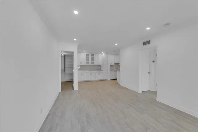 a view of kitchen with wooden floor