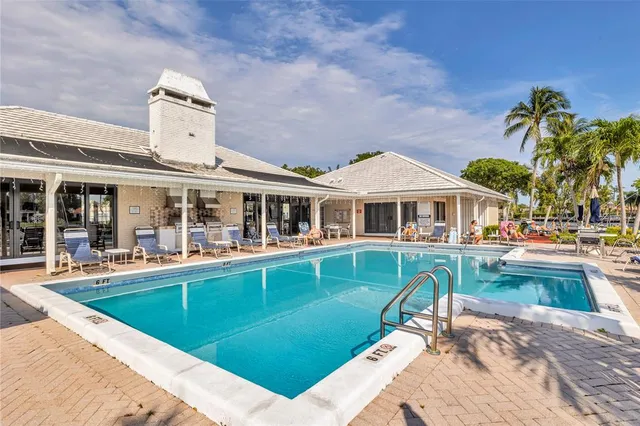 a view of a lake with sitting area