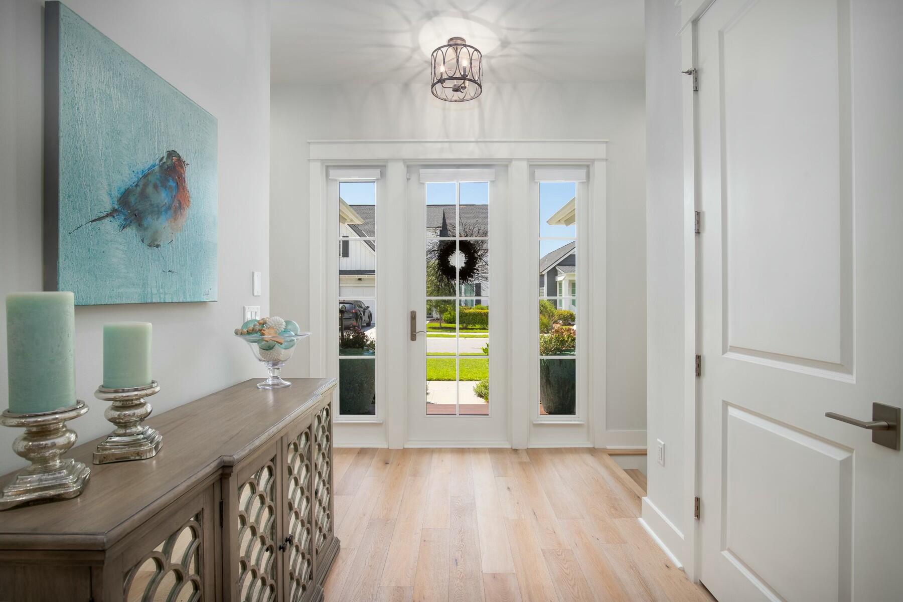 91 Catface Dr Inlet Beach Inlet Beach, FL 32461 - Photo 20 of 23 a view of a hallway to a livingroom with furniture and window