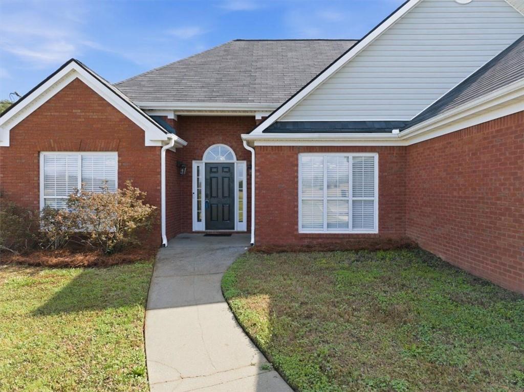 493 Youth Jersey Road Covington, GA 30014 - Photo 6 of 52 a view of a house with garden