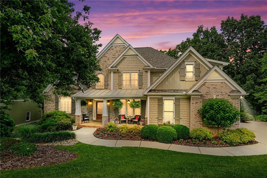 509 Crested Hawk Ridge Canton, GA 30114 - Photo 2 of 89 a front view of a house with a yard
