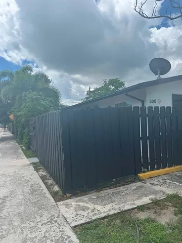 a kitchen with stainless steel appliances granite countertop a refrigerator sink and cabinets