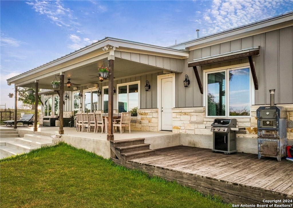345 Laguna Road Bandera, TX 78003 - Photo 22 of 35 a view of living room and patio area