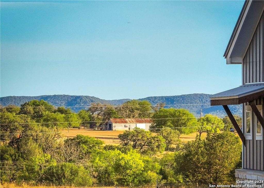 345 Laguna Road Bandera, TX 78003 - Photo 24 of 35 a view of lake view and mountain