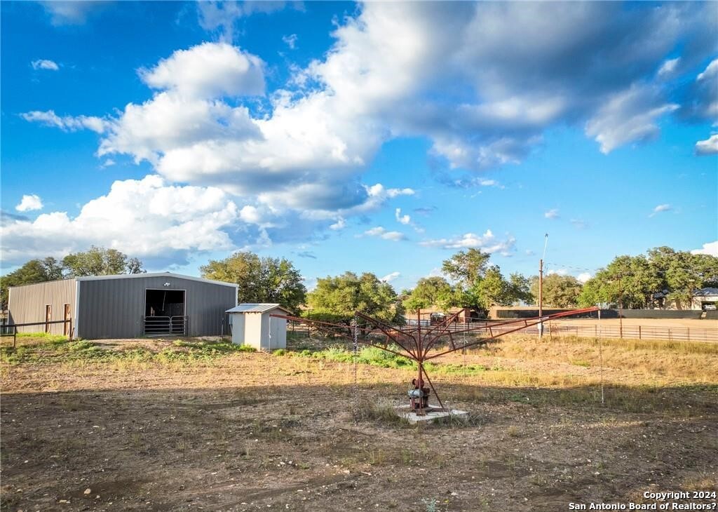 345 Laguna Road Bandera, TX 78003 - Photo 27 of 35 a view of swimming pool with an outdoor space