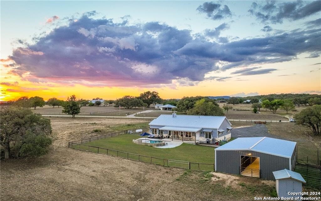345 Laguna Road Bandera, TX 78003 - Photo 3 of 35 a view of a lake with a mountain