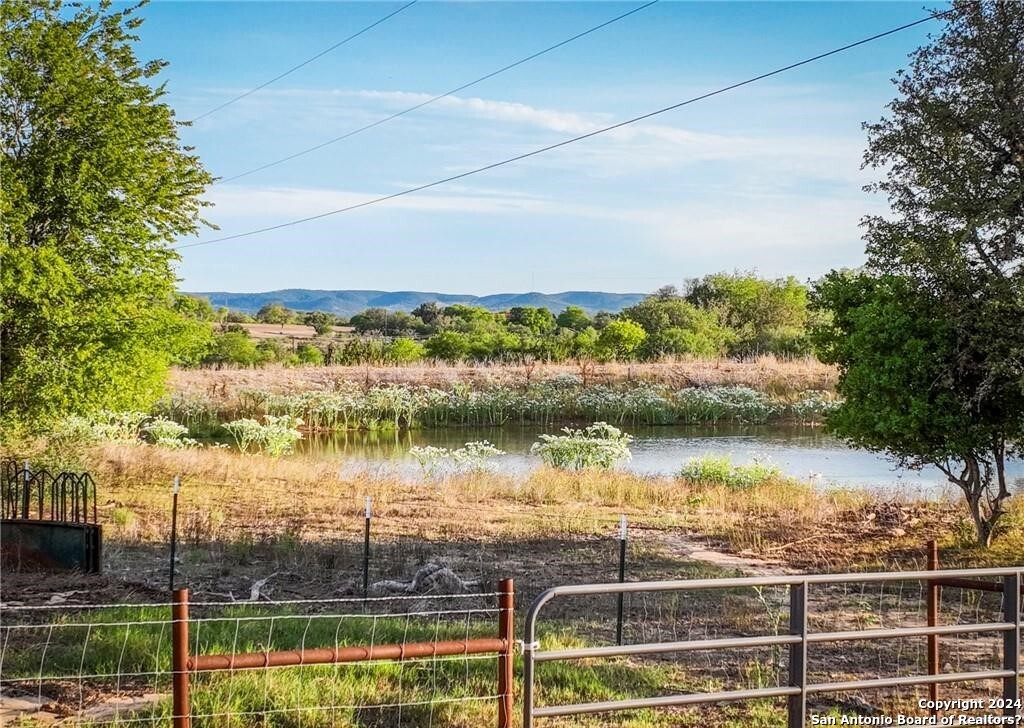 345 Laguna Road Bandera, TX 78003 - Photo 31 of 35 a view of a lake